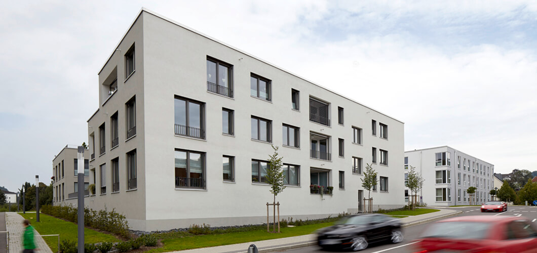 Teaser1 zeigt ein Foto Blick in die Rospestrasse Quartier Ackermann Gummersbach von Damrau Kusserow Architekten